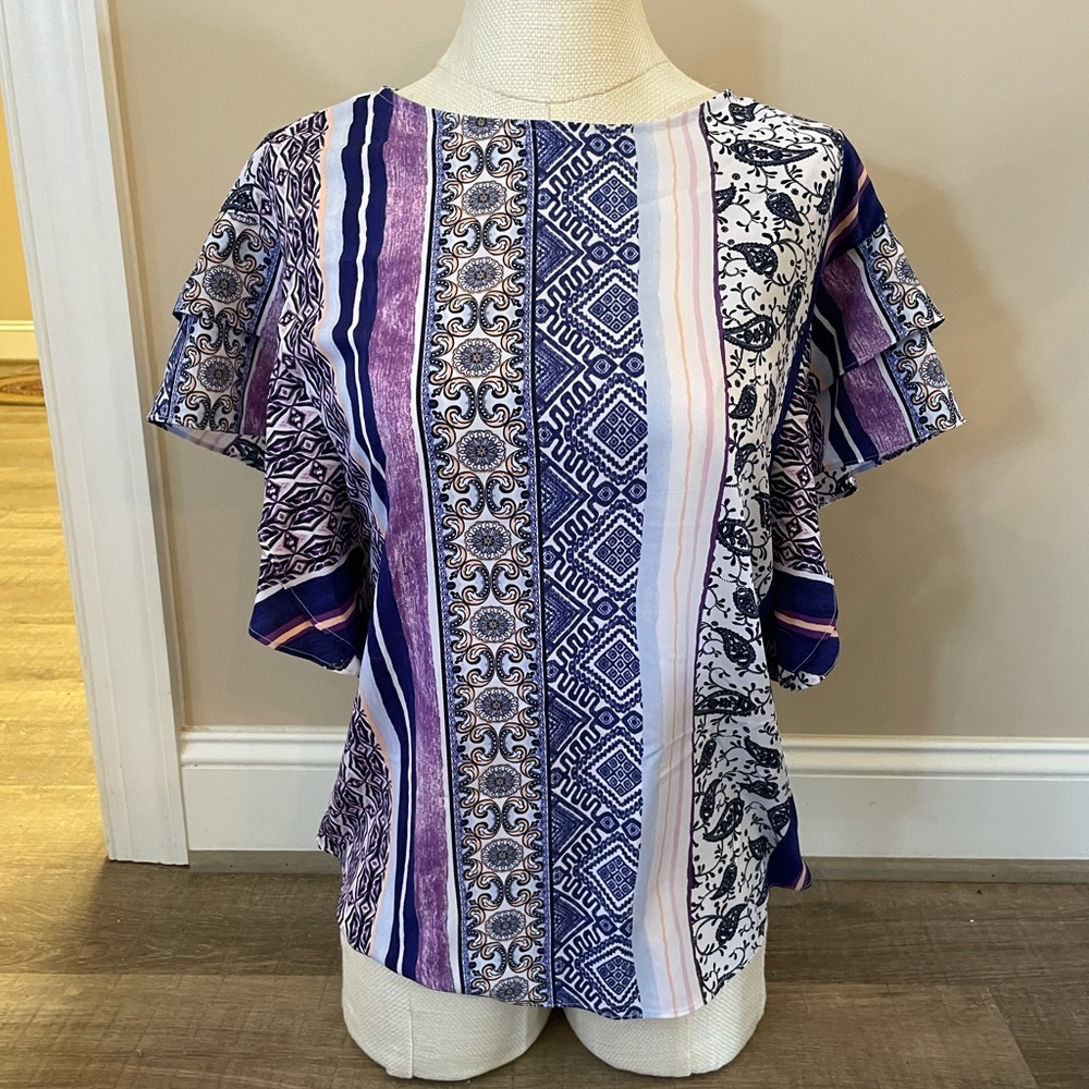 Chicos size 0 light, flowy blouse.   Flattering on.
